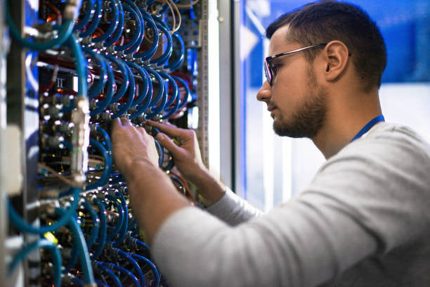 Man working on Data Cables